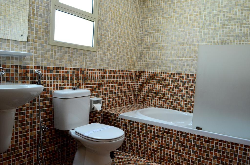 President Suites Apartments Манама Екстериор снимка